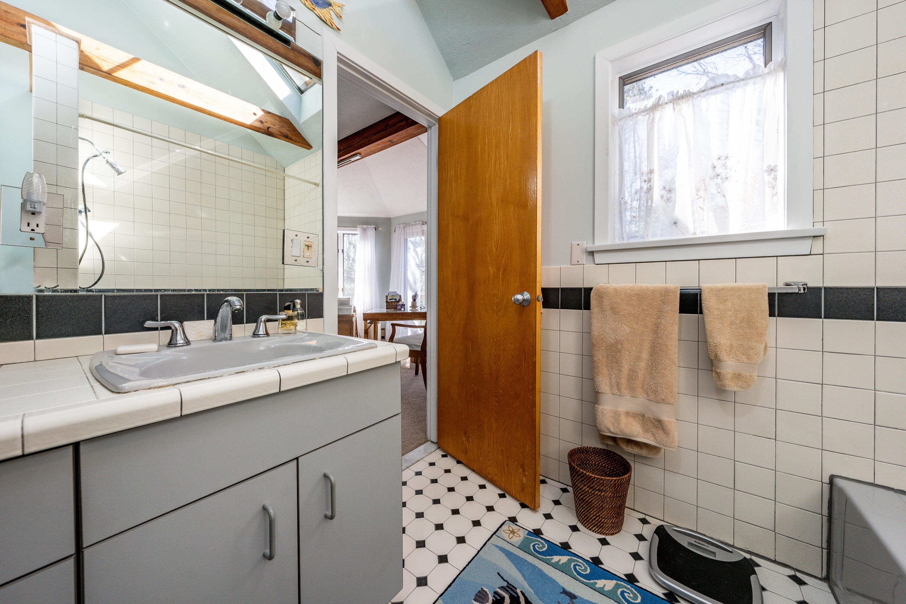 79 Waterside Drive Centerville, MA 02632 - Photo 28 of 50 a bathroom with a sink and a mirror