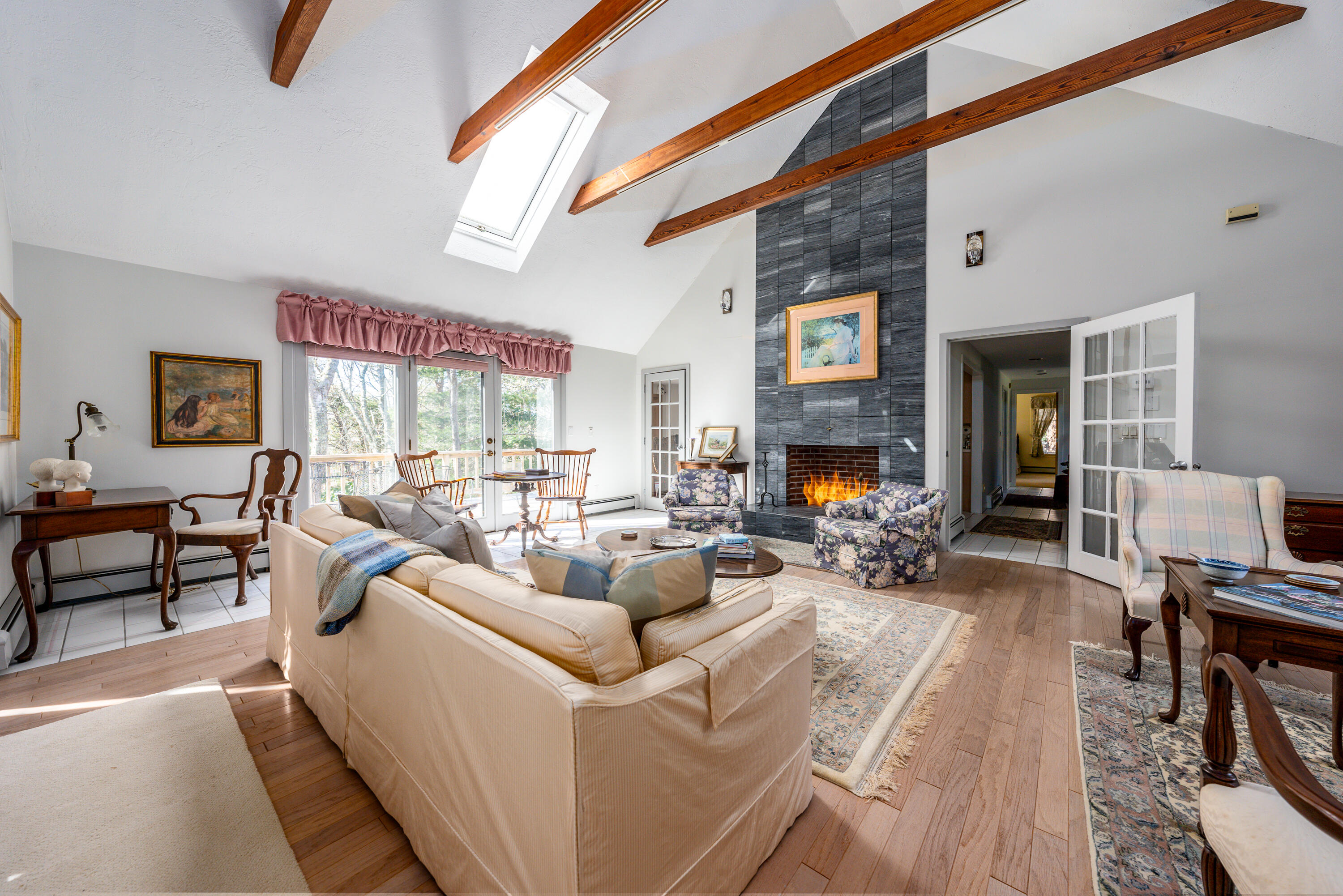 79 Waterside Drive Centerville, MA 02632 - Photo 3 of 50 a living room with fireplace furniture and a flat screen tv