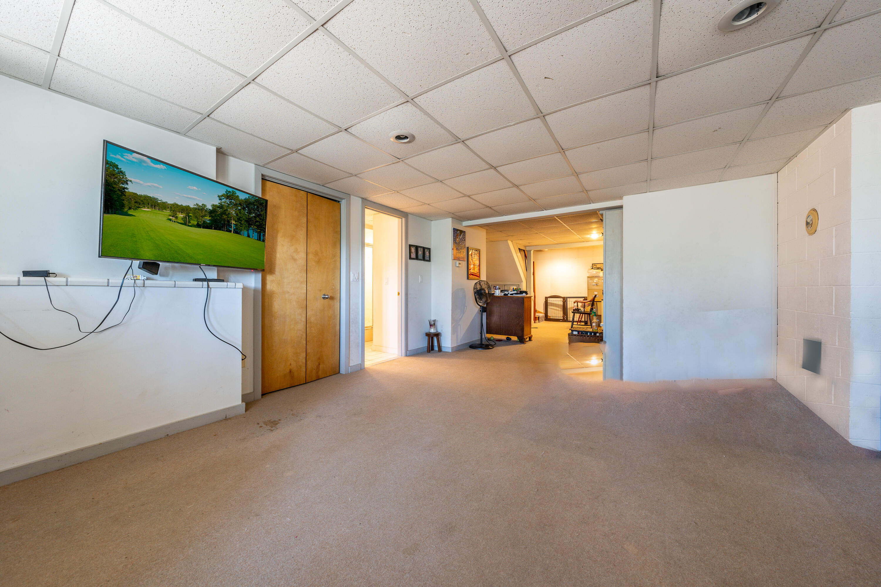 79 Waterside Drive Centerville, MA 02632 - Photo 31 of 50 a view of empty room with a fireplace and window