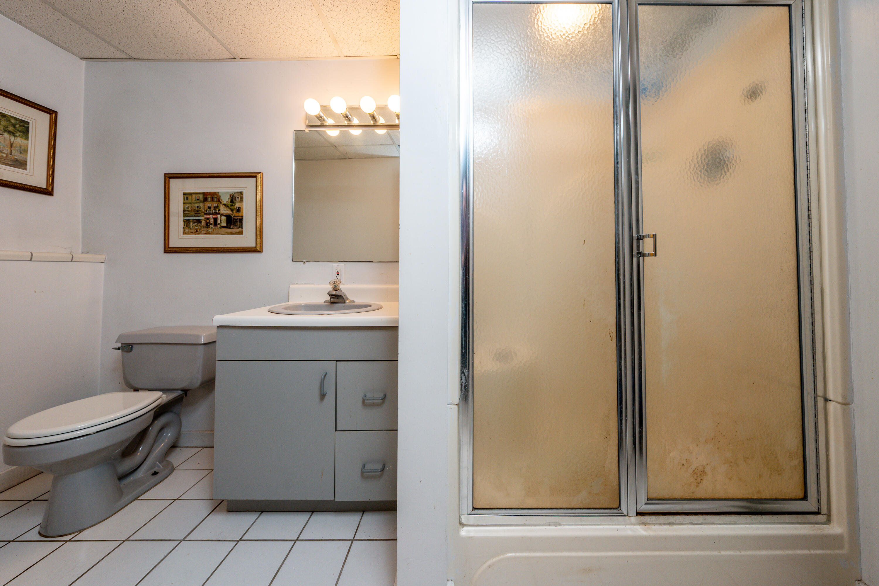 79 Waterside Drive Centerville, MA 02632 - Photo 32 of 50 a bathroom with a toilet sink and mirror