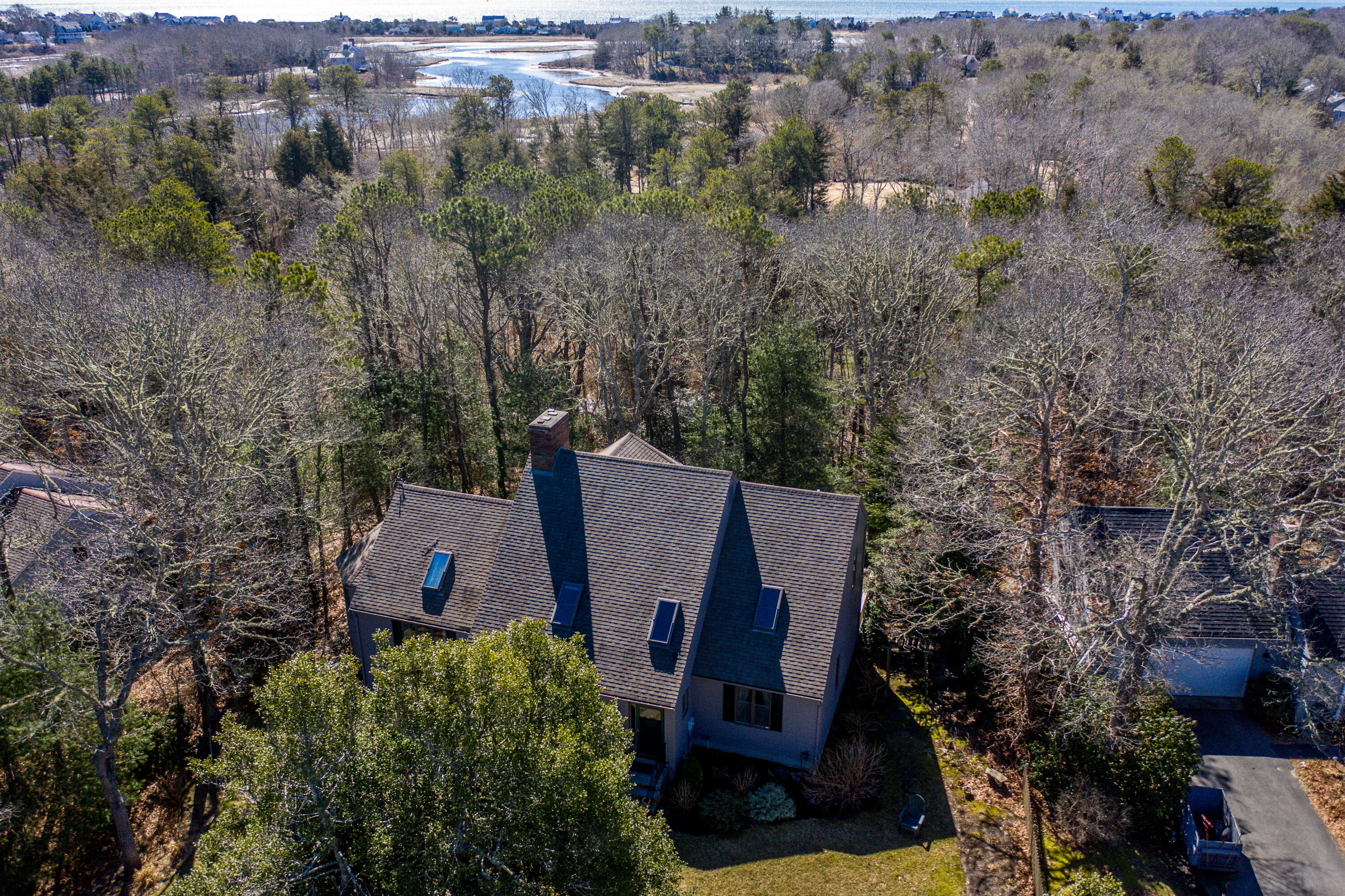 79 Waterside Drive Centerville, MA 02632 - Photo 39 of 50 an aerial view of a house with yard and outdoor seating