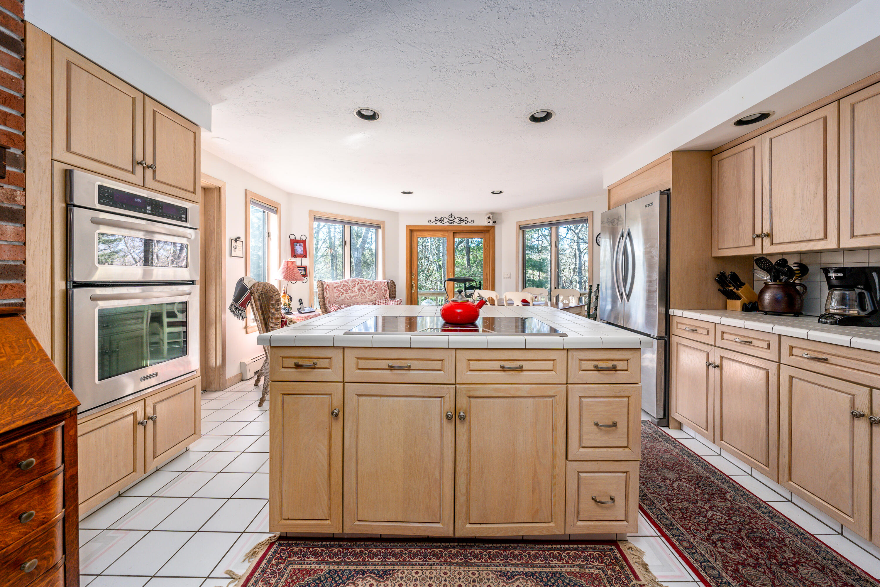 79 Waterside Drive Centerville, MA 02632 - Photo 4 of 50 a view of kitchen with stainless steel appliances granite countertop a stove and a sink