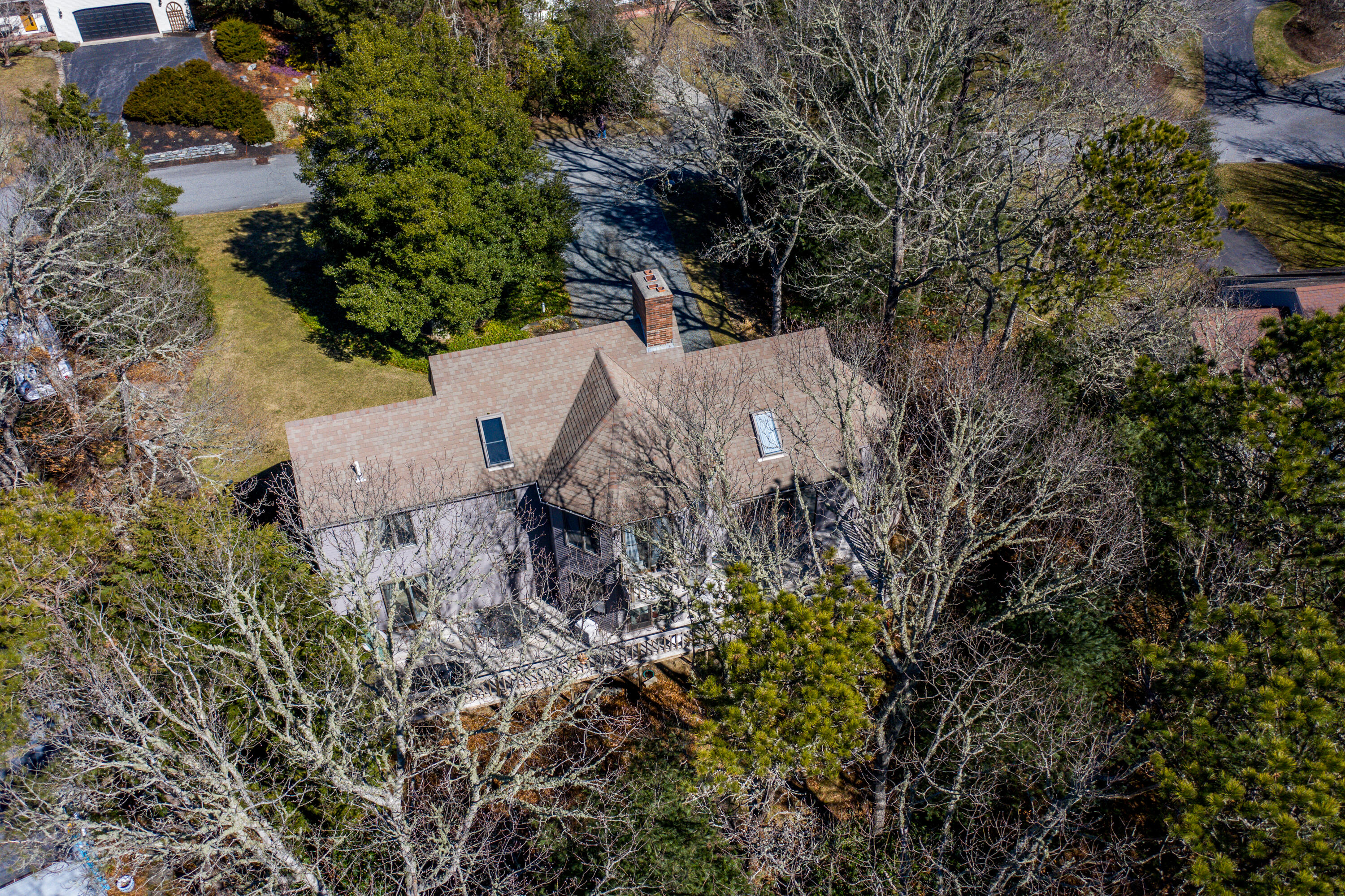 79 Waterside Drive Centerville, MA 02632 - Photo 43 of 50 an aerial view of a house with a yard and garden