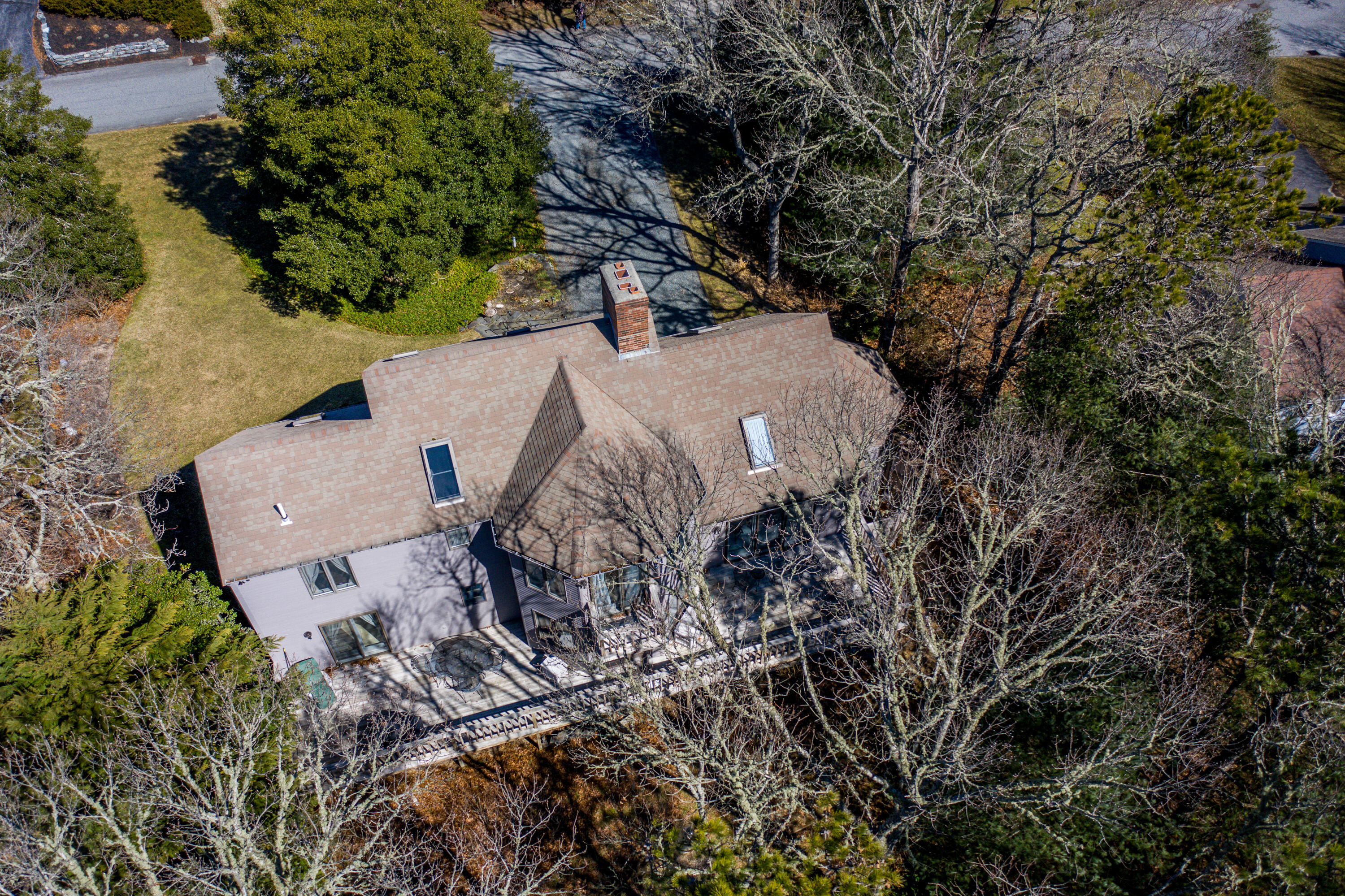 79 Waterside Drive Centerville, MA 02632 - Photo 44 of 50 an aerial view of a house with a yard and covered with trees