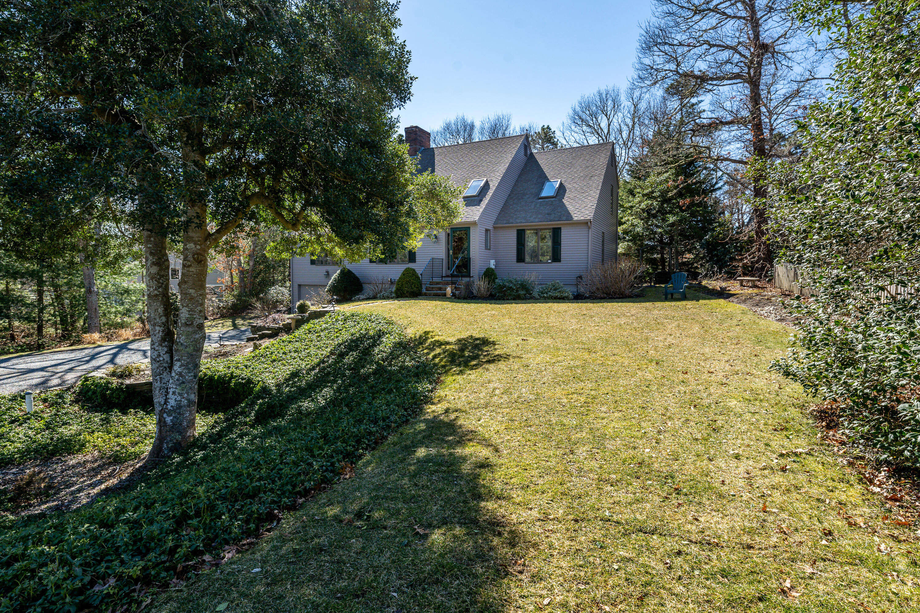 79 Waterside Drive Centerville, MA 02632 - Photo 46 of 50 a front view of a house with a yard