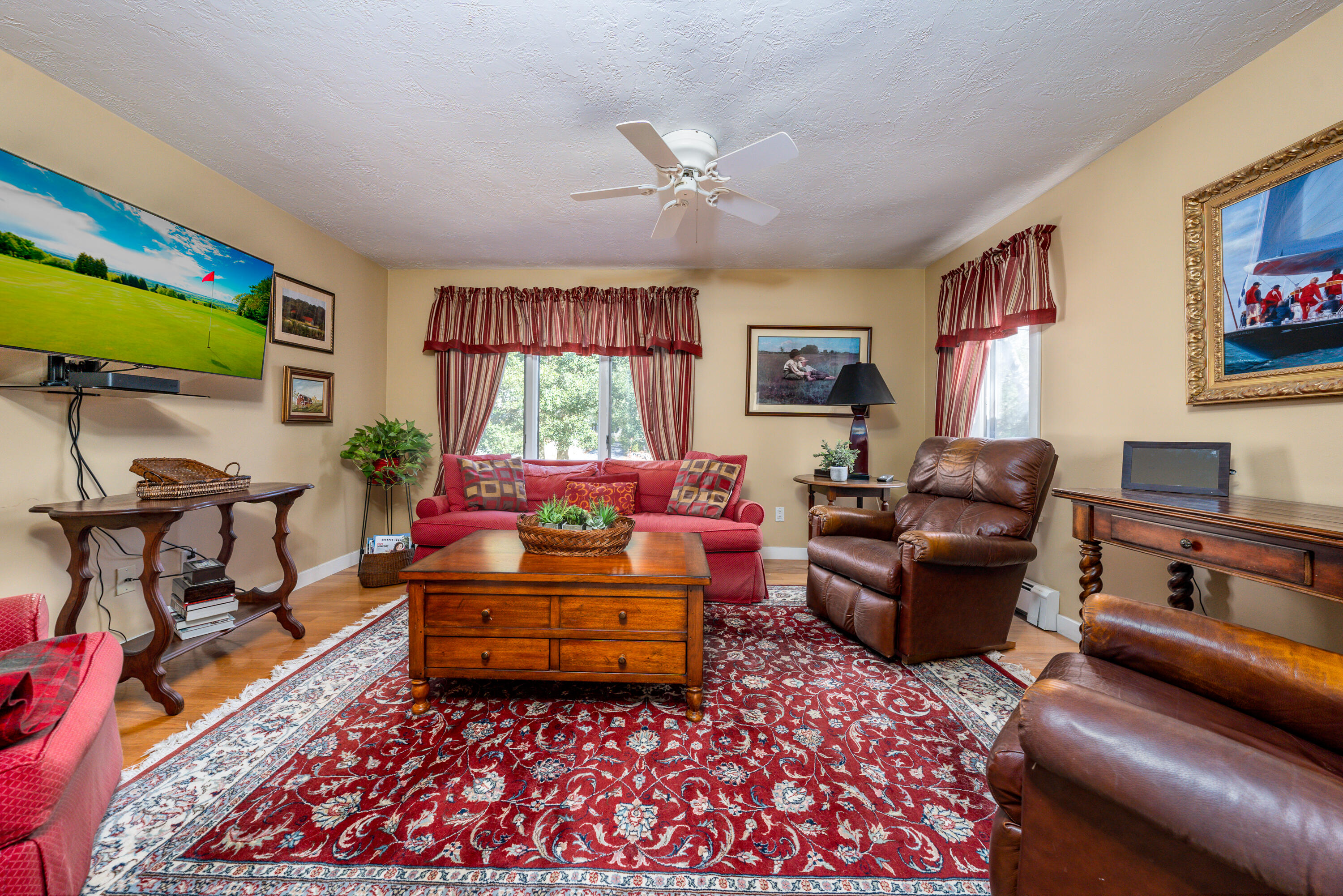79 Waterside Drive Centerville, MA 02632 - Photo 6 of 50 a living room with furniture and a flat screen tv