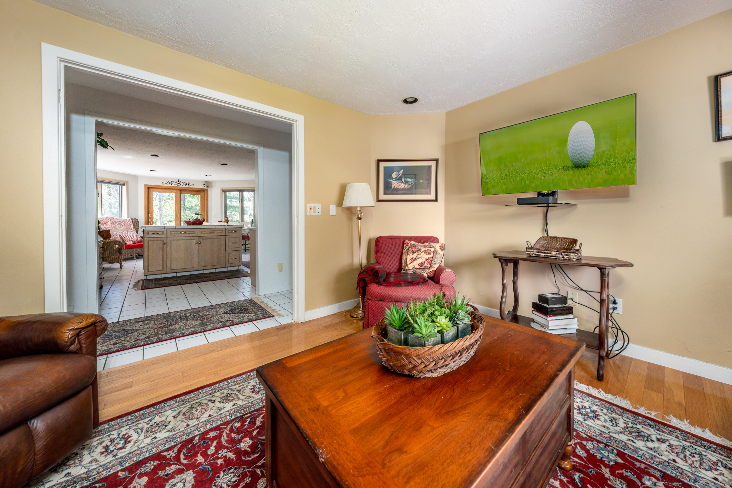 79 Waterside Drive Centerville, MA 02632 - Photo 7 of 50 a living room with furniture and a potted plant