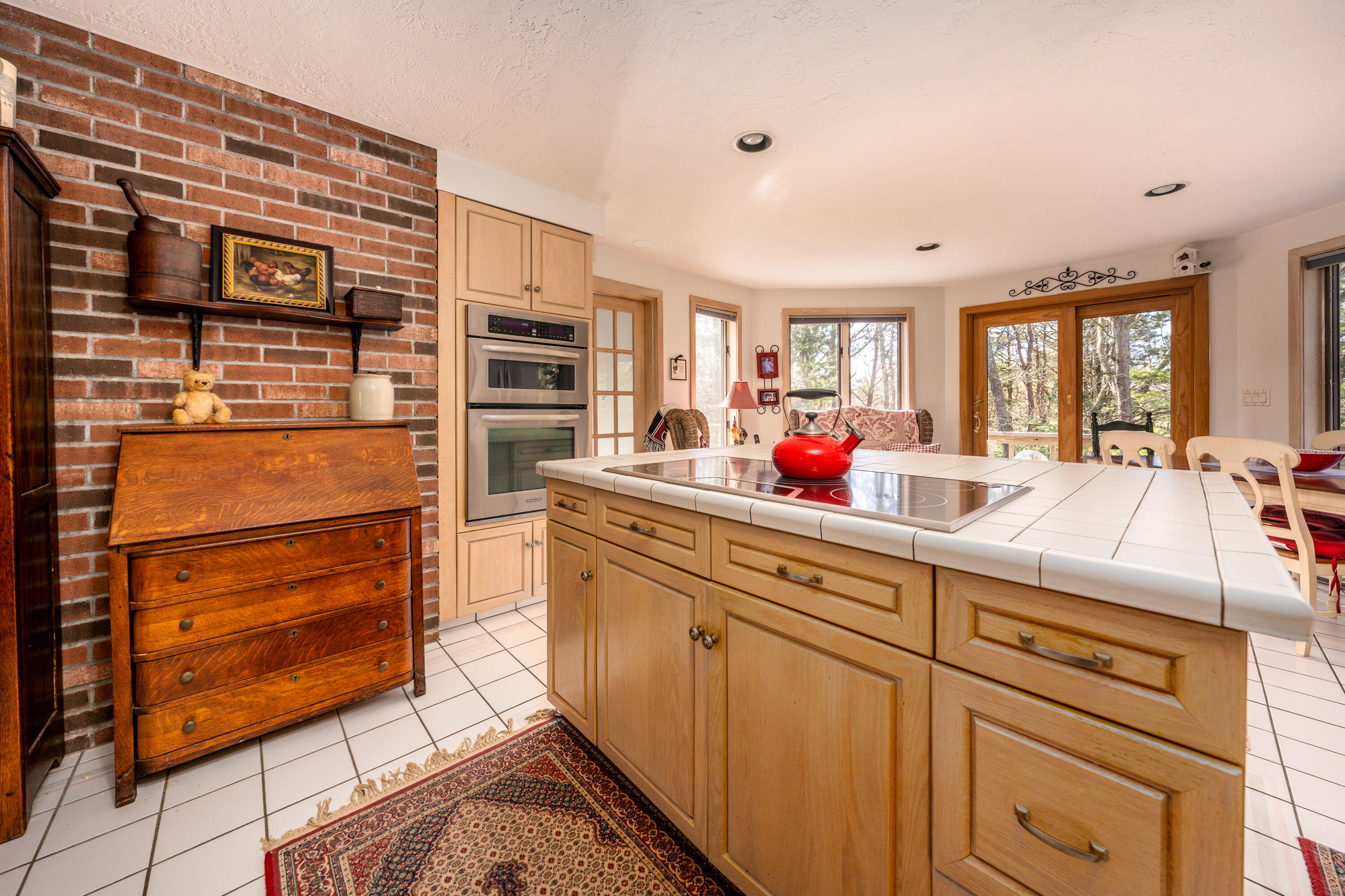 79 Waterside Drive Centerville, MA 02632 - Photo 8 of 50 a kitchen with stainless steel appliances kitchen island granite countertop a stove and cabinets