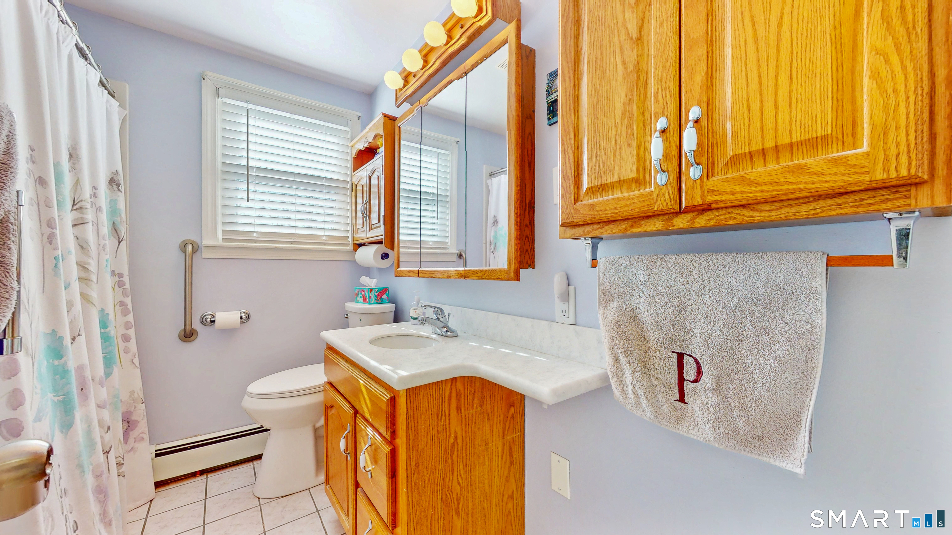 38 Eastgate Lane Enfield, CT 06082 - Photo 16 of 33 a bathroom with a sink and a bathtub