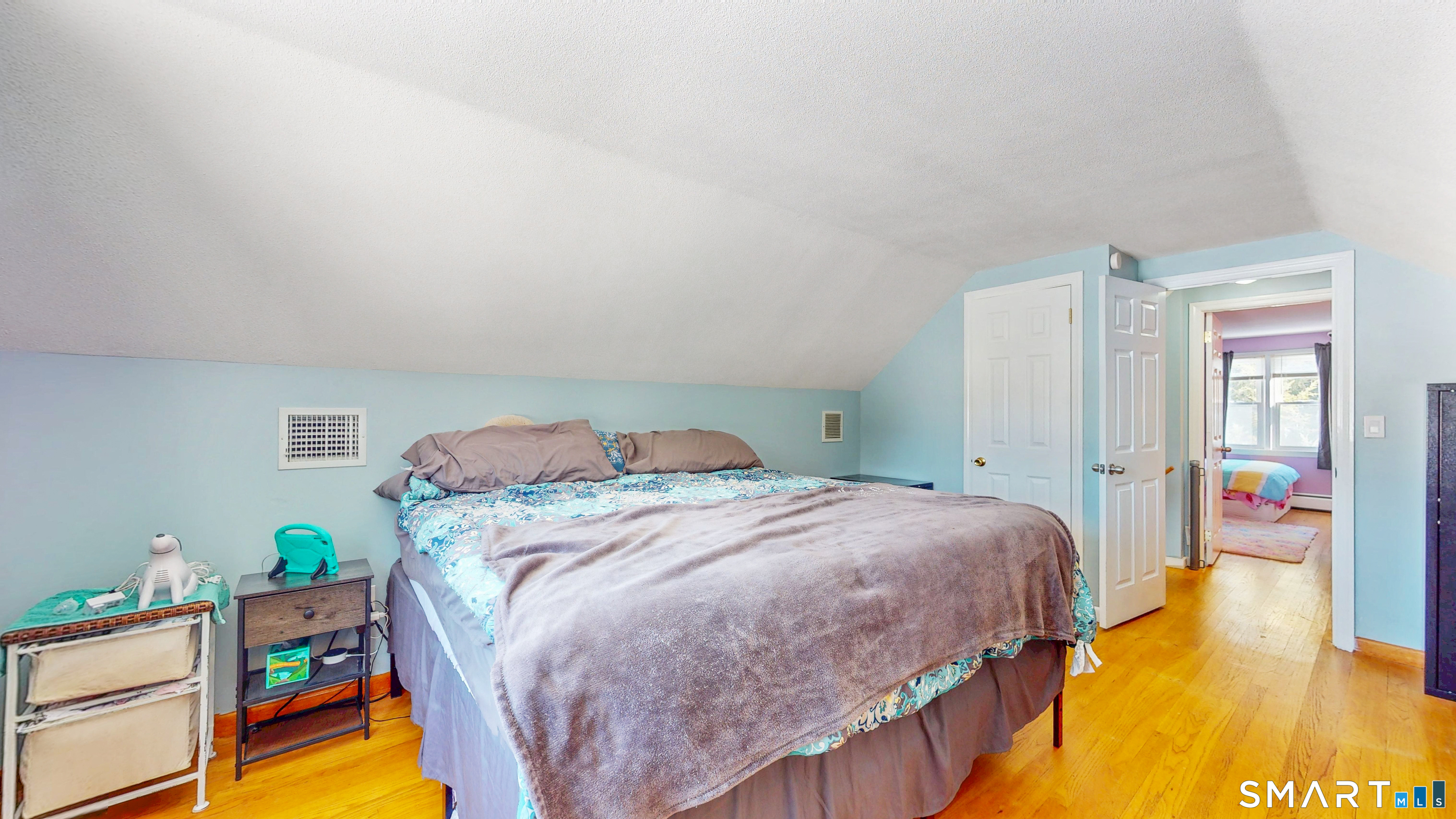 38 Eastgate Lane Enfield, CT 06082 - Photo 20 of 33 a bedroom with a bed and a dresser in it