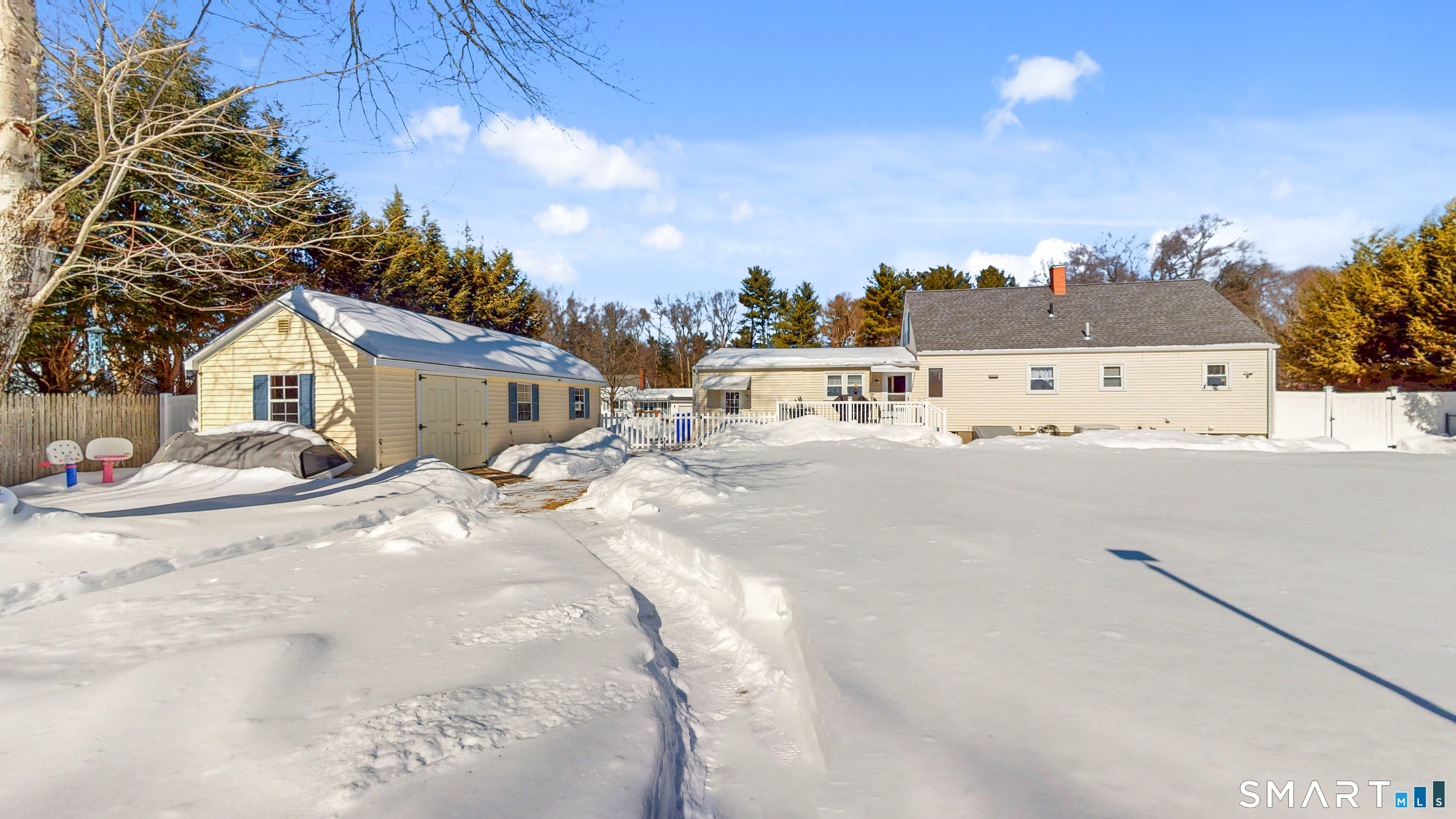 38 Eastgate Lane Enfield, CT 06082 - Photo 28 of 33 a view of a house with a snow on the road