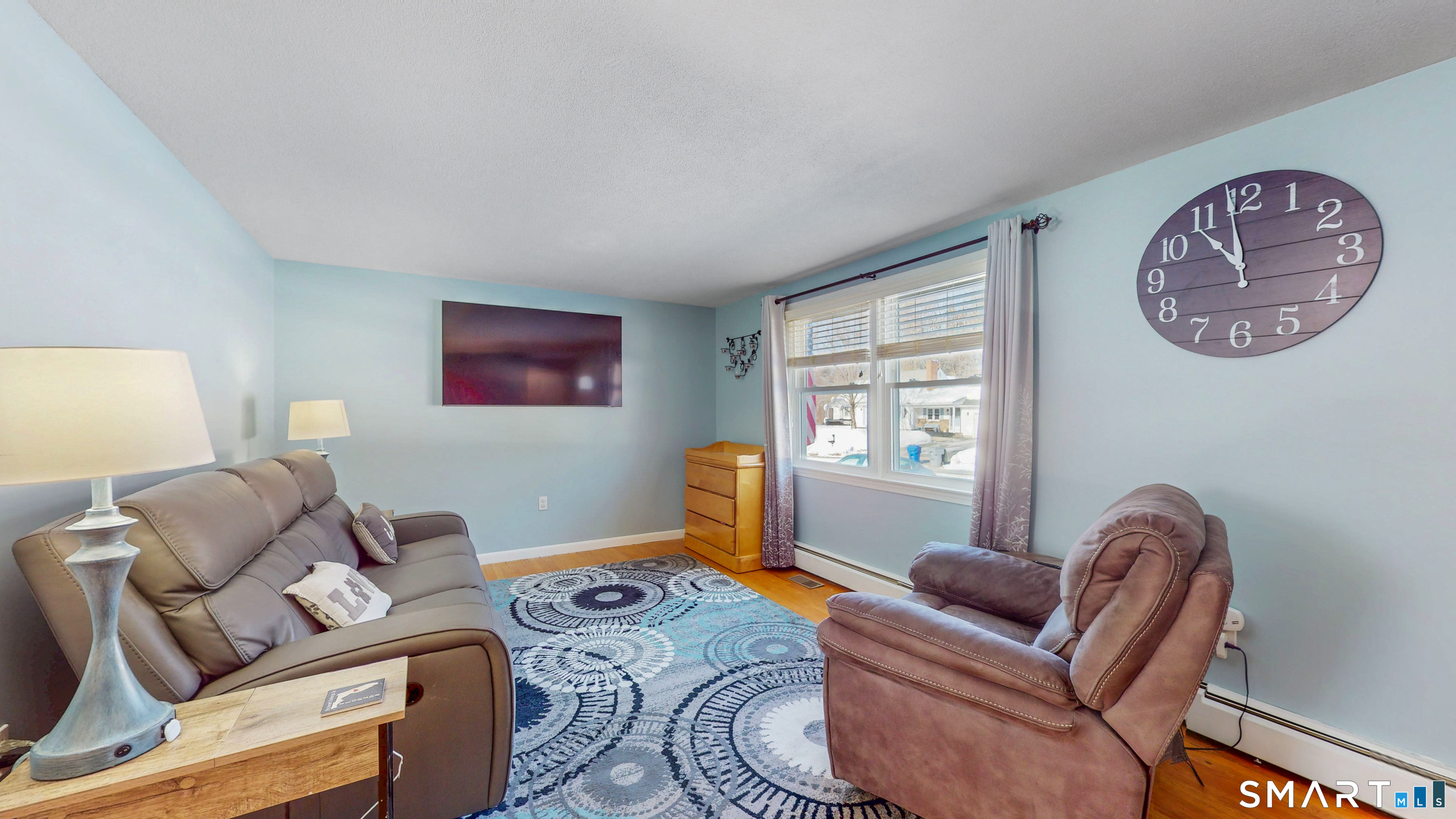 38 Eastgate Lane Enfield, CT 06082 - Photo 6 of 33 a living room with furniture a couch and a window