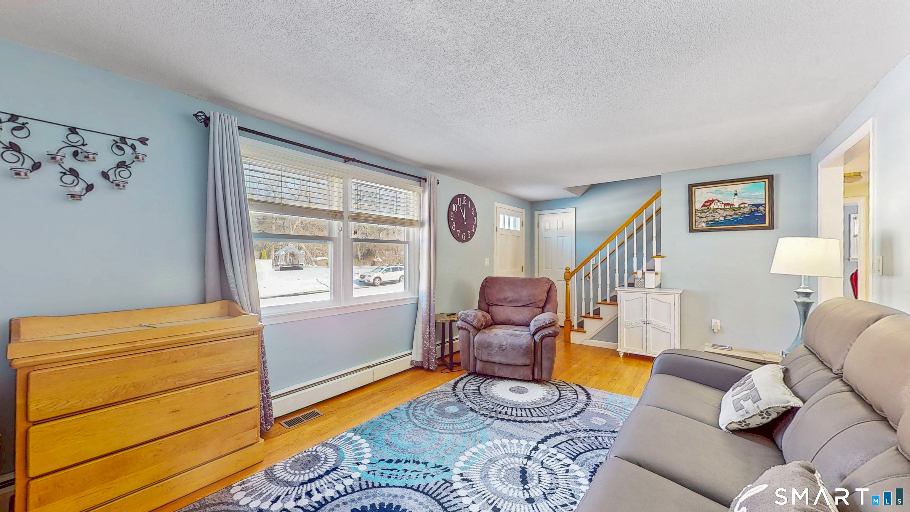38 Eastgate Lane Enfield, CT 06082 - Photo 8 of 33 a living room with furniture and a window