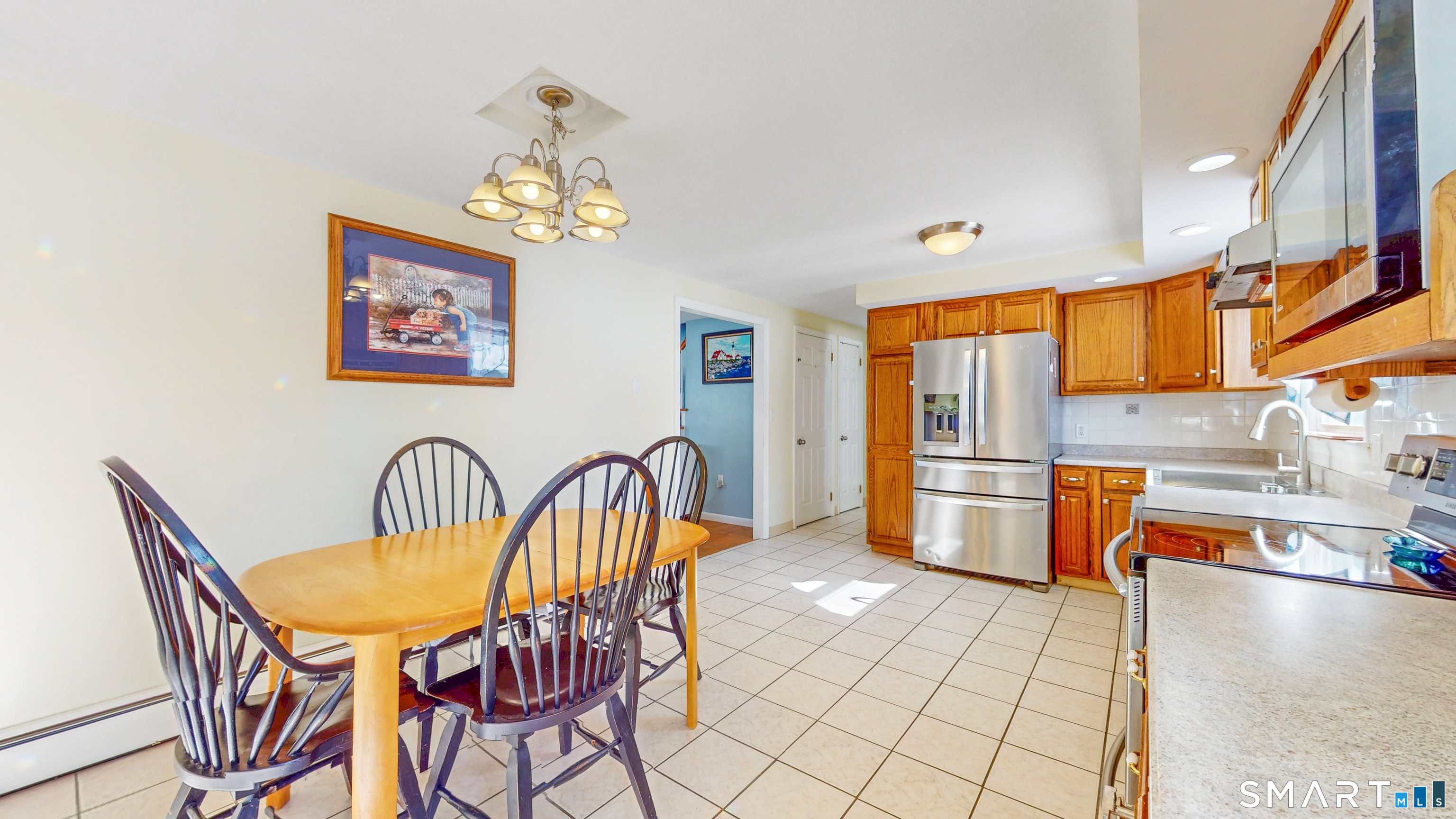 38 Eastgate Lane Enfield, CT 06082 - Photo 9 of 33 a view of a dining room with furniture