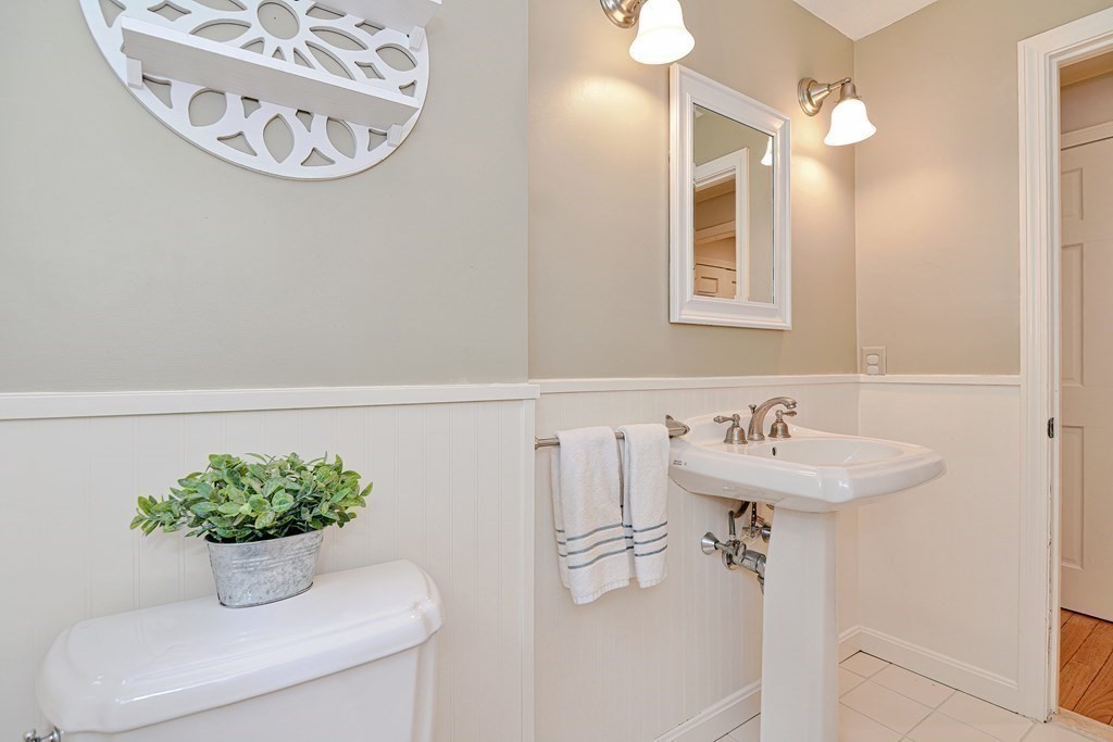 1 Ivy Lane Ashland, MA 01721 - Photo 17 of 42 a bathroom with a sink mirror and vanity