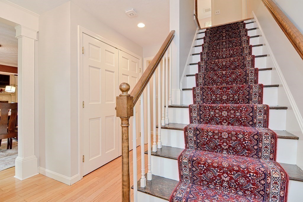1 Ivy Lane Ashland, MA 01721 - Photo 22 of 42 a very nice looking room with wooden floor and entryway