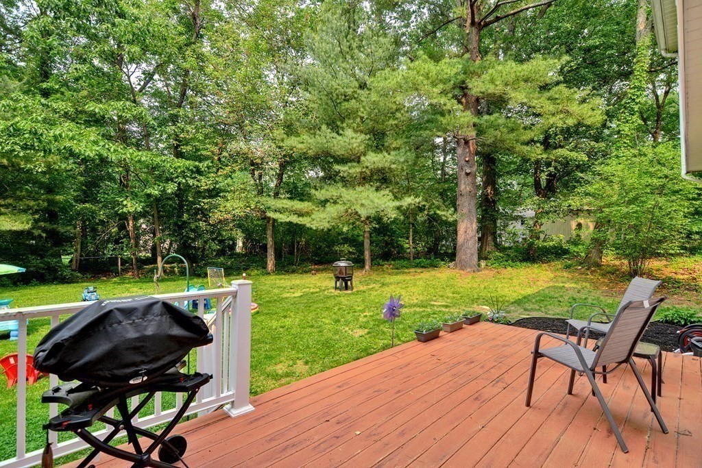 1 Ivy Lane Ashland, MA 01721 - Photo 34 of 42 a view of a backyard with sitting area furniture and garden