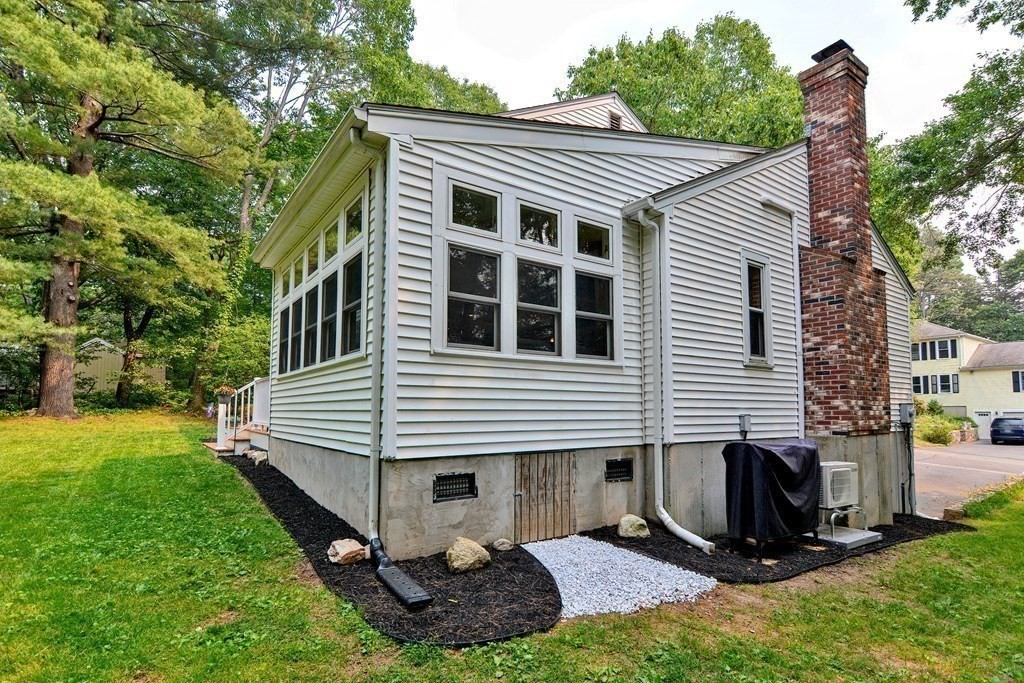1 Ivy Lane Ashland, MA 01721 - Photo 37 of 42 a front view of a house with a yard