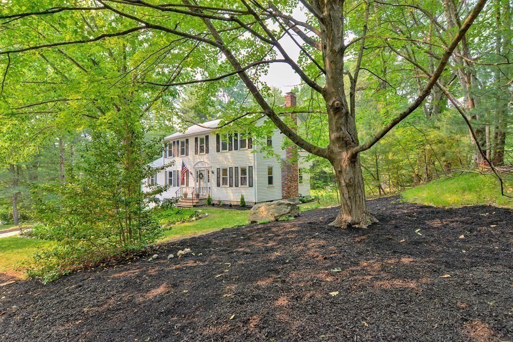 1 Ivy Lane Ashland, MA 01721 - Photo 39 of 42 a view of a house with a yard and large trees
