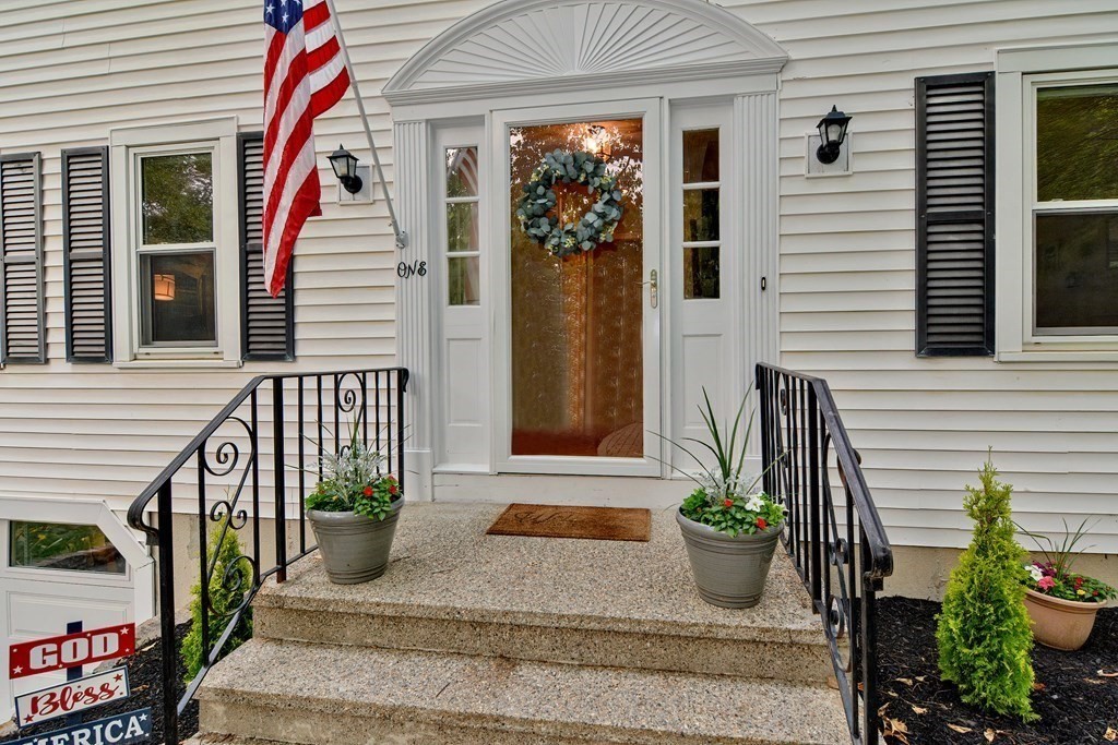 1 Ivy Lane Ashland, MA 01721 - Photo 5 of 42 a view of a entryway door front of house
