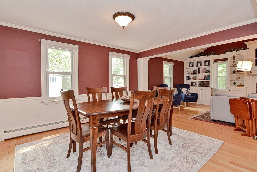 1 Ivy Lane Ashland, MA 01721 - Photo 8 of 42 a view of a dining room with furniture window and wooden floor