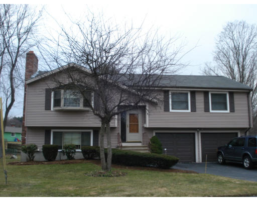 19 Leonard Road Framingham, MA 01701 - Photo 1 of 1 a view of a yard in front of a house