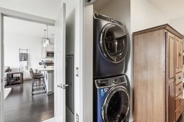 a view of livingroom with washer and dryer