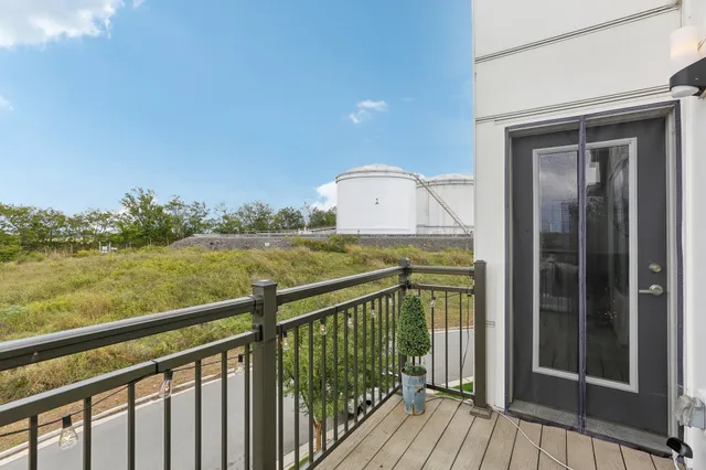 a view of a balcony with an ocean view