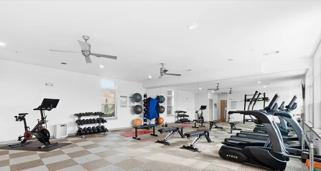 a view of a room with gym equipment