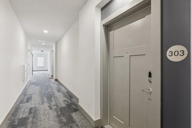 a view of a hallway with a elevator