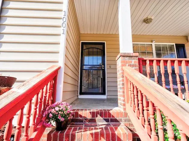 a view of a balcony with a potted plant