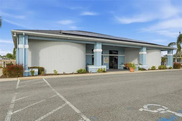 an aerial view of a house with a lake view