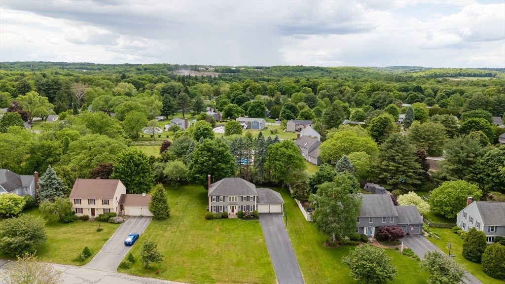 15 Lanthorn Road Northborough, MA 01532 - Photo 33 of 37 an aerial view of a house with swimming pool a yard and mountain view