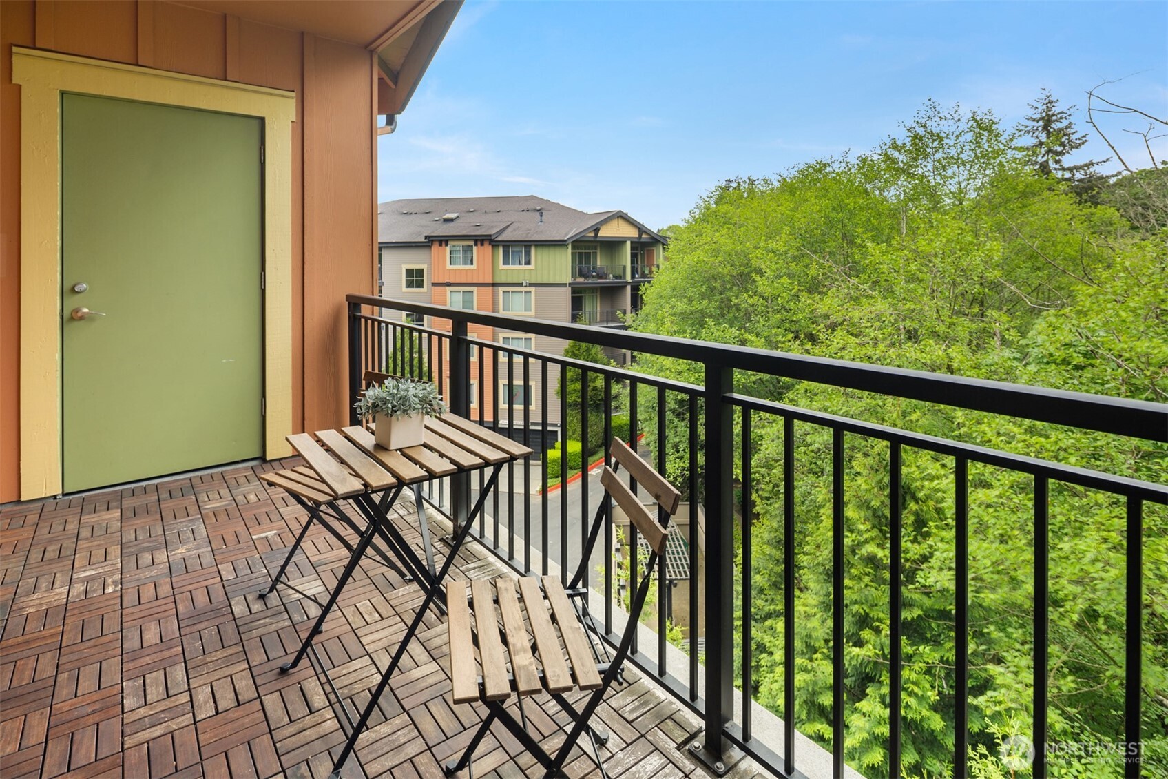 15700 116th Avenue Northeast, Unit 404 Bothell, WA 98011 - Photo 15 of 31 a view of a balcony with wooden floor and outdoor space