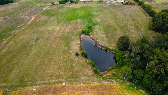 a view of a lake with a big yard