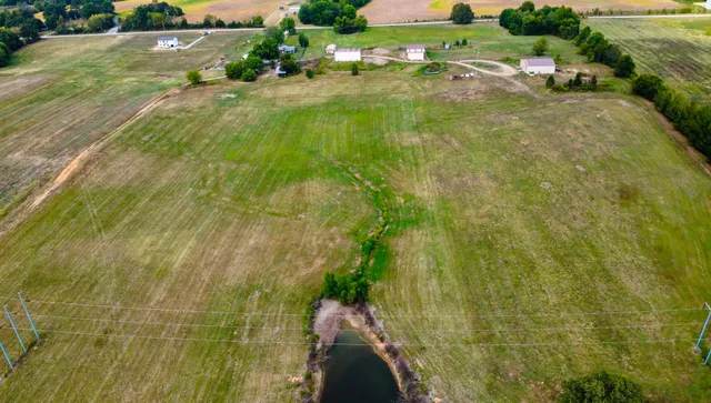 a view of a golf course with a lake view