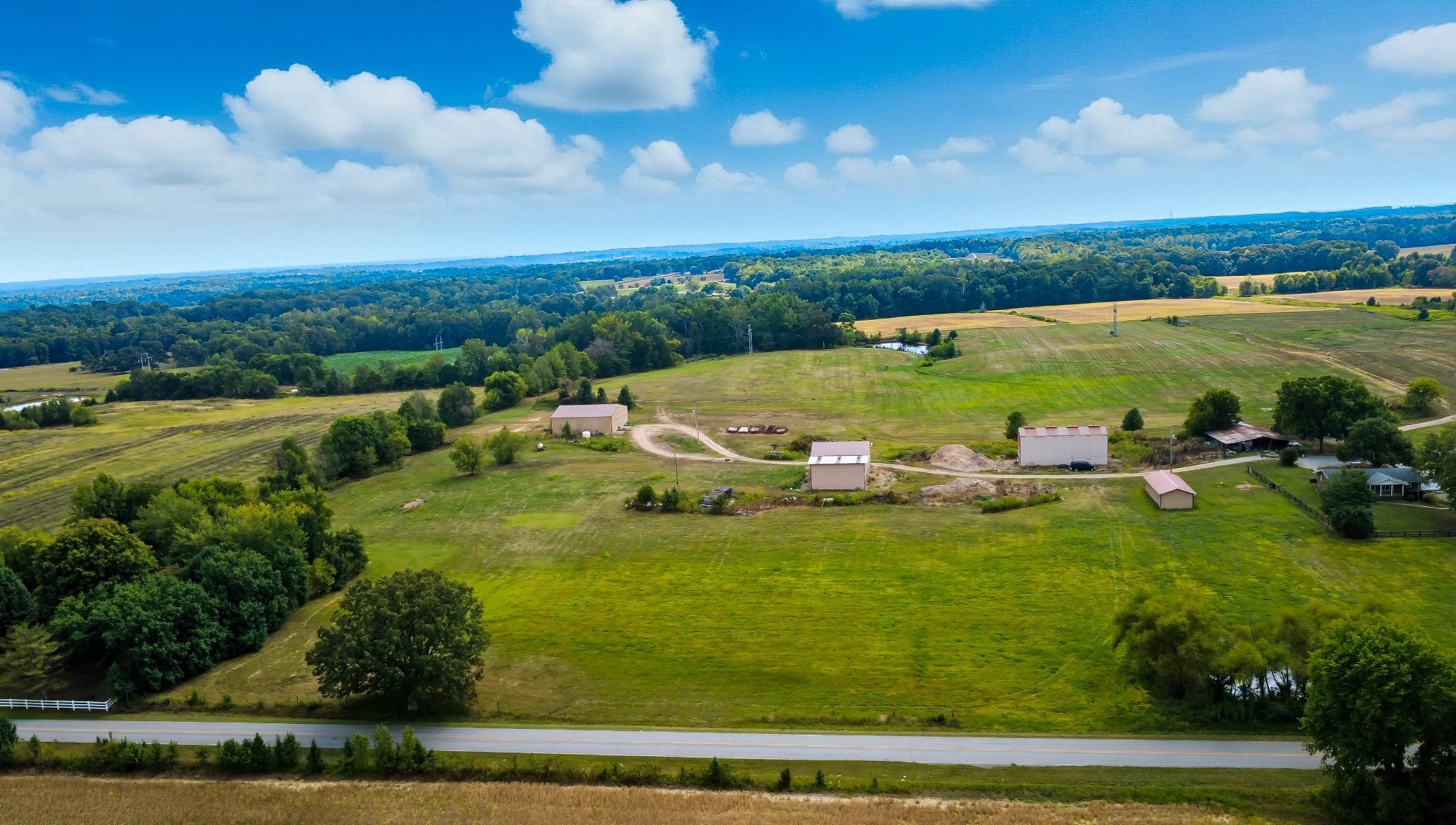 22 Indian Mound Road Woodlawn, TN 37191 - Photo 16 of 29 a view of a golf course with a lake view