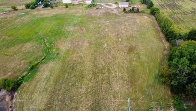 a view of a lake with a big yard