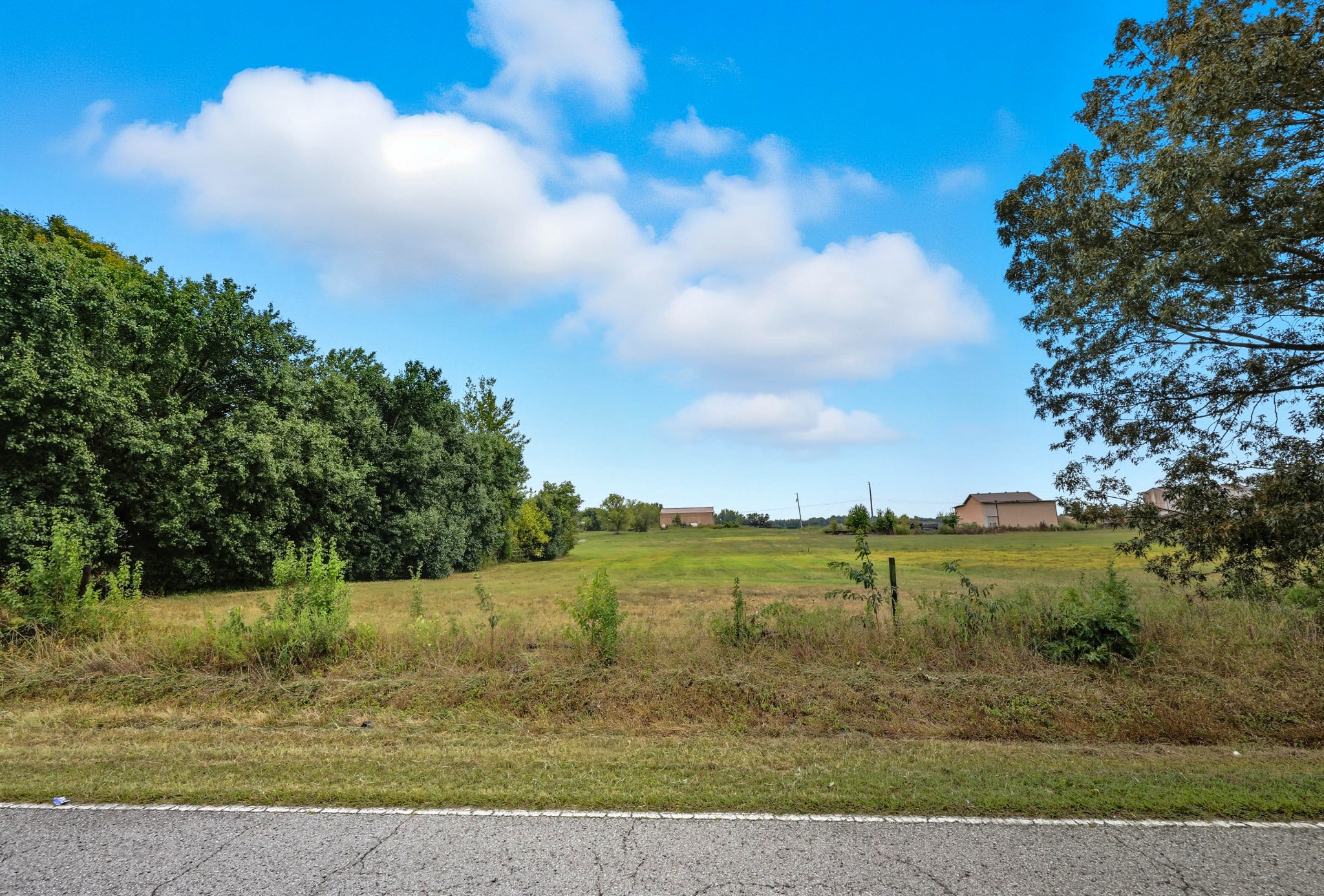 22 Indian Mound Road Woodlawn, TN 37191 - Photo 27 of 29 a view of a lake with a big yard