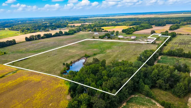 a view of an ocean house and mountain view