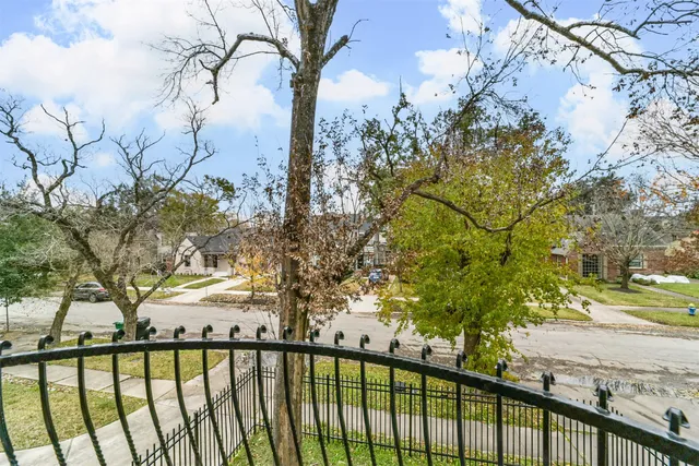 a view of street from a balcony