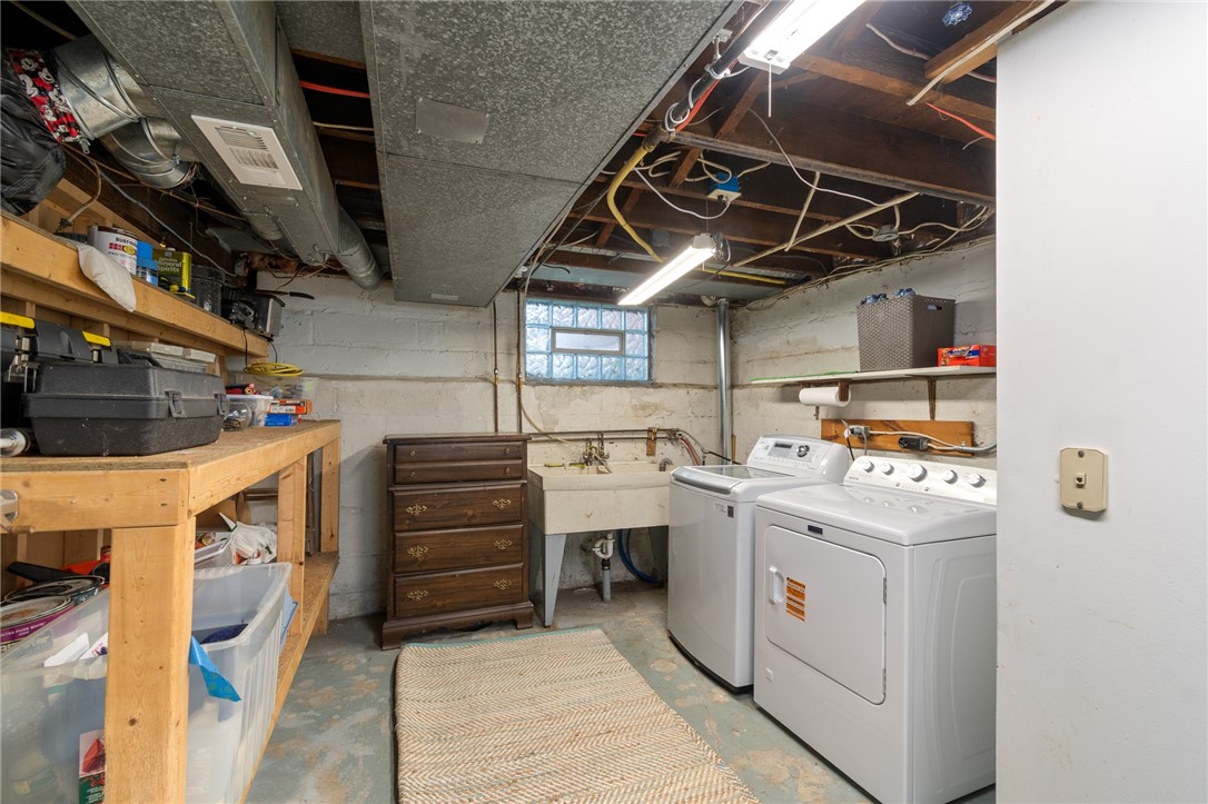 235 Wildmere Road Irondequoit, NY 14617 - Photo 35 of 41 The LAUNDRY ROOM/WORKSHOP - lots of BUILT IN storage for all your needs!