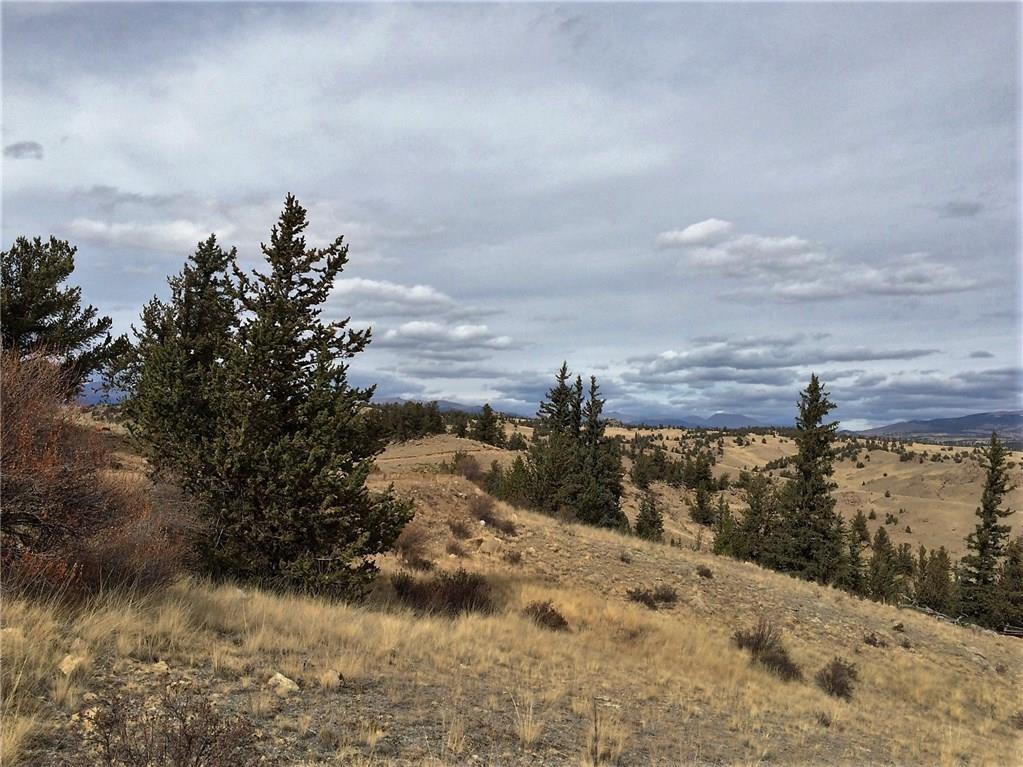 230 Arland Road Como, CO 80432 - Photo 3 of 15 a view of a road with a snow in the background