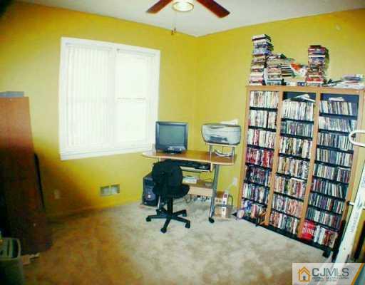 22 Caldwell Road Edison, NJ 08817 - Photo 6 of 8 a view of a workspace with furniture
