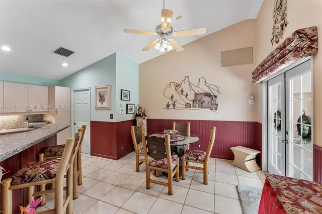 a view of a dining room with furniture