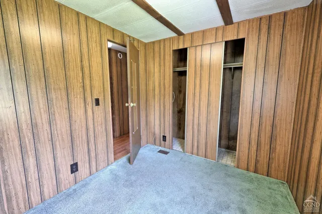 an aerial view of a house with a garden