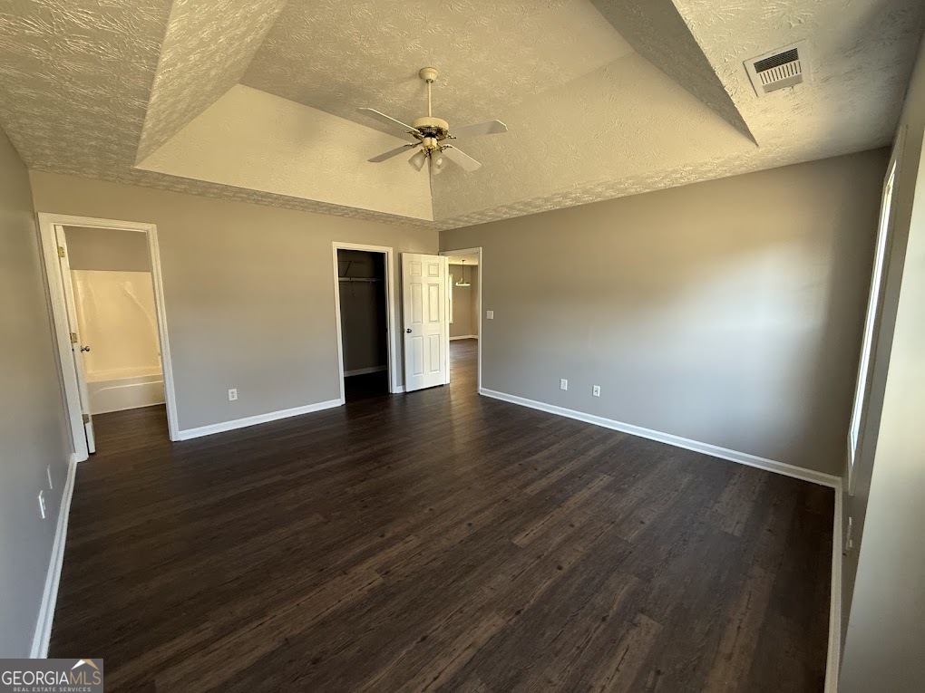 419 Shenandoah Court Winder, GA 30680 - Photo 7 of 12 a view of an empty room with wooden floor