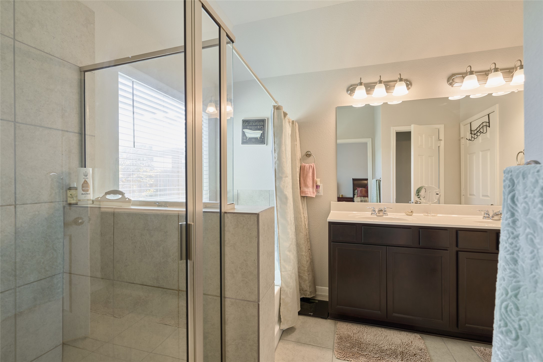 2020 Cedar Tree Court Conroe, TX 77301 - Photo 17 of 26 Master bedroom features ensuitebathroom w/soaking tub, separate shower & his/her sinks