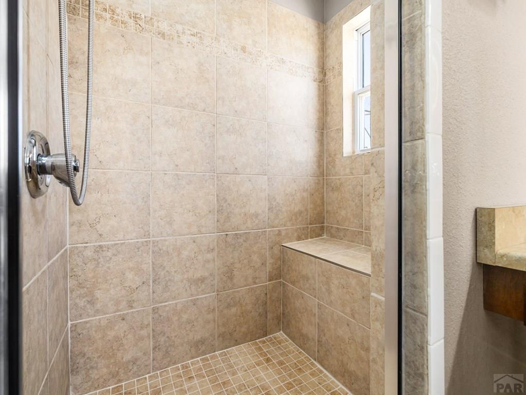 43948 Hunsaker Road Avondale, CO 81022 - Photo 25 of 56 a bathroom with a shower