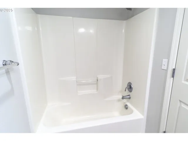 a view of kitchen with wooden floor